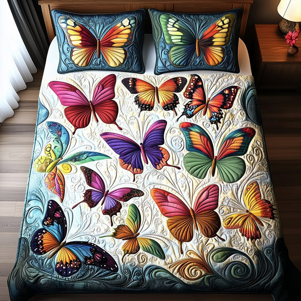 Butterfly quilted 3-piece bedding set on a made bed with two matching pillow shams