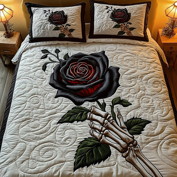 Charming Black Rose For U quilted 3-piece bedding set on a made bed with two matching pillow shams