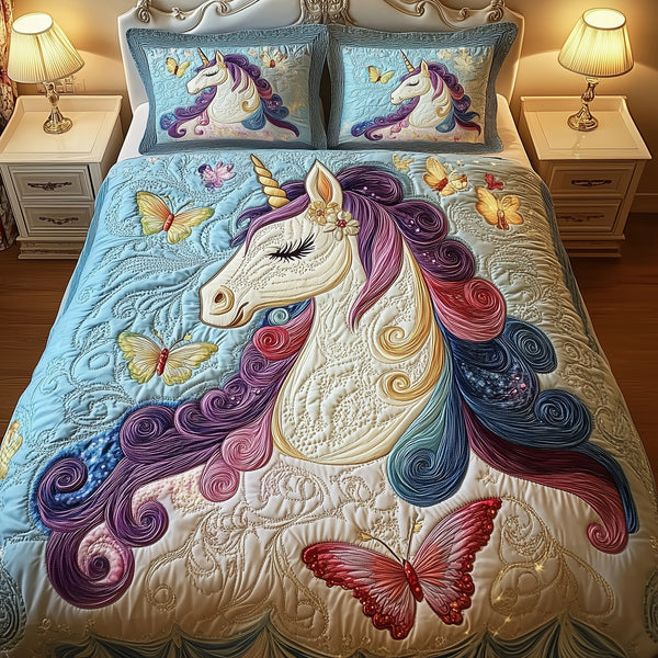 Dreamlight Unicorn quilted 3-piece bedding set on a made bed with two matching pillow shams