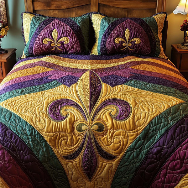 Fleur De Lis quilted 3-piece bedding set on a made bed with two matching pillow shams