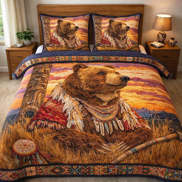 Bear Totem Strength quilted 3-piece bedding set on a made bed with two matching pillow shams