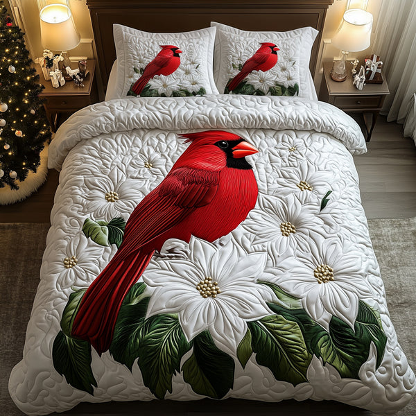 Cardinals in Bloom quilted 3-piece bedding set on a made bed with two matching pillow shams