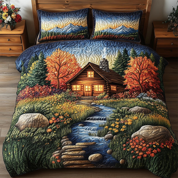 Amber Forest Refuge quilted 3-piece bedding set on a made bed with two matching pillow shams