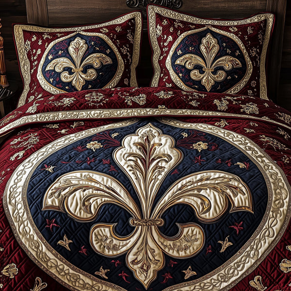 Fleur de lis quilted 3-piece bedding set on a made bed with two matching pillow shams