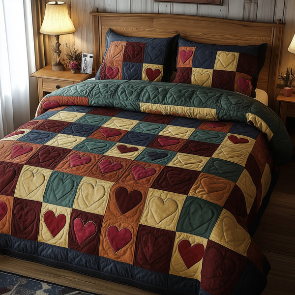 Burgundy Heart Shape quilted 3-piece bedding set on a made bed with two matching pillow shams