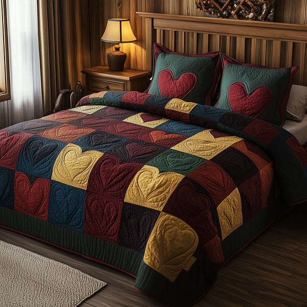 Burgundy Heart Shape quilted 3-piece bedding set on a made bed with two matching pillow shams