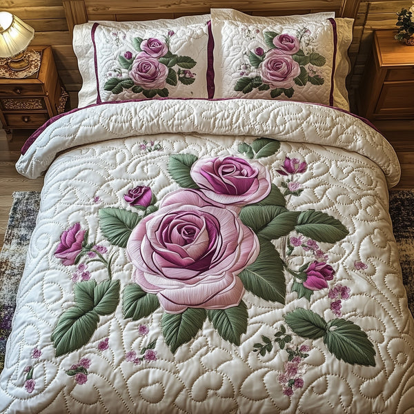 Elegance Rose quilted 3-piece bedding set on a made bed with two matching pillow shams