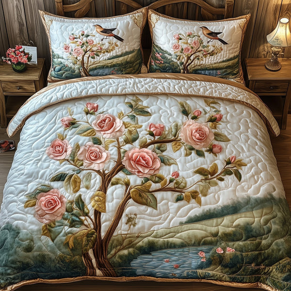 Elegance Rose quilted 3-piece bedding set on a made bed with two matching pillow shams