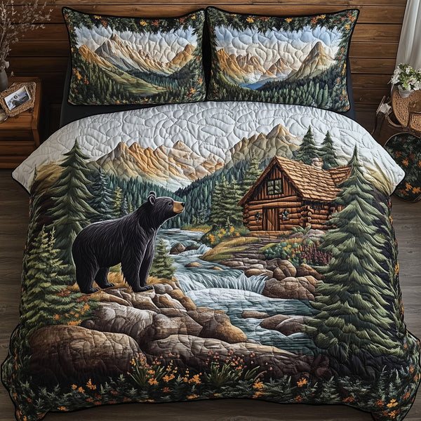 Bear and Cabin quilted 3-piece bedding set on a made bed with two matching pillow shams
