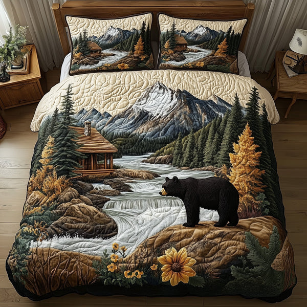 Bear and Cabin quilted 3-piece bedding set on a made bed with two matching pillow shams