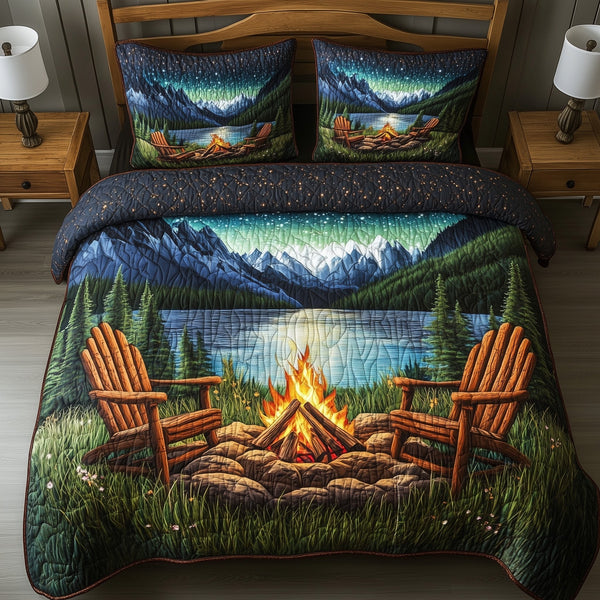 Aurora Campfire Night quilted 3-piece bedding set on a made bed with two matching pillow shams