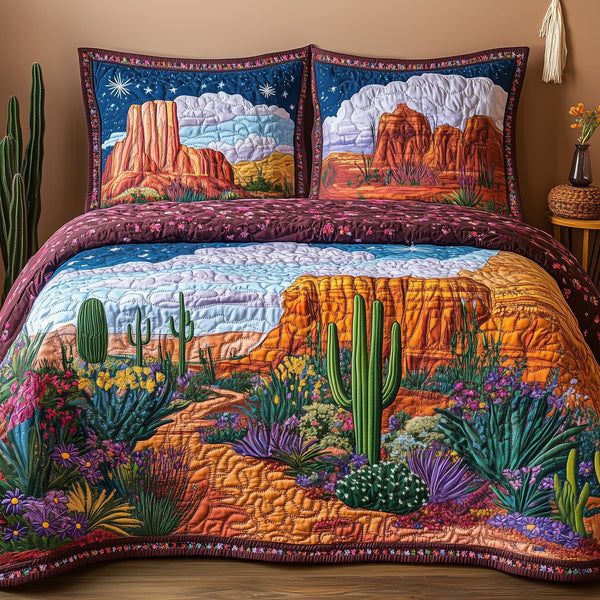 Canyon Bloom Symphony quilted 3-piece bedding set on a made bed with two matching pillow shams