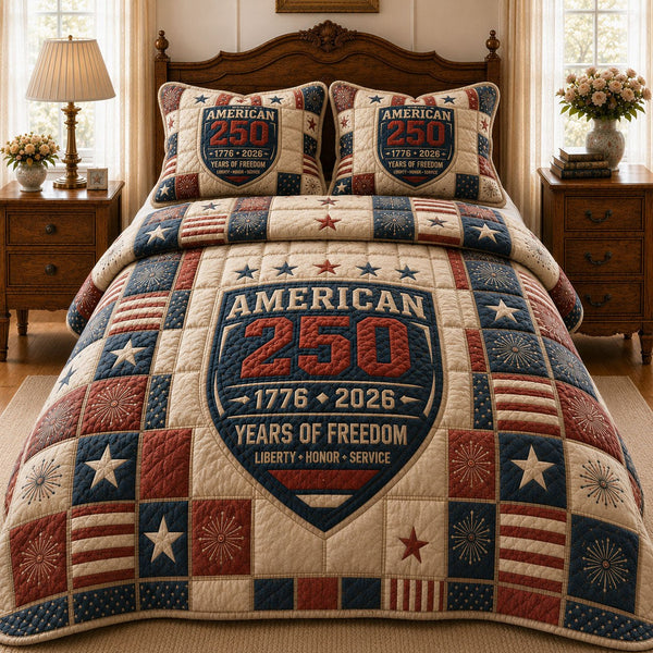 American 250 quilted 3-piece bedding set on a made bed in a warmly lit bedroom