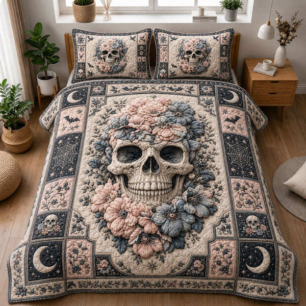 Blush Gothic Floral Skull quilted 3-piece bedding set on a made bed against a dark styled interior