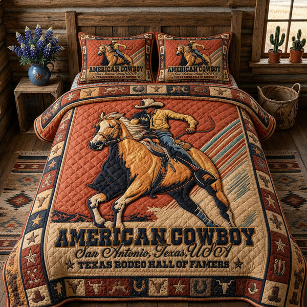 American Cowboy Legacy quilted 3-piece bedding set on a made bed in a warmly lit bedroom