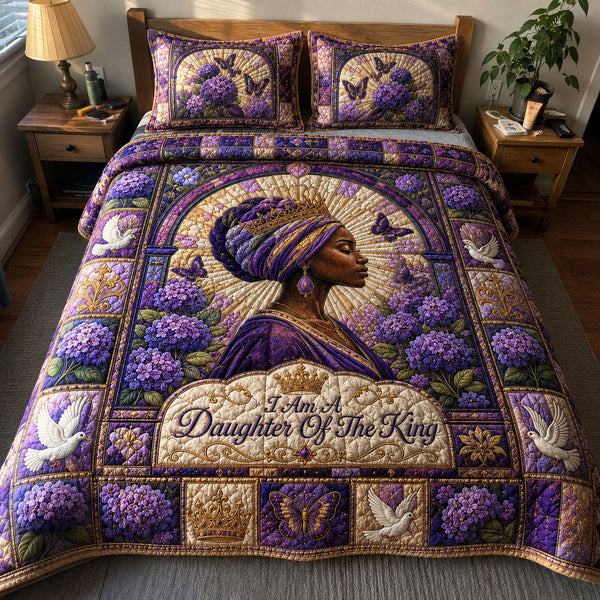 Daughter Of the King Majesty quilted 3-piece bedding set on a made bed with two matching pillow shams