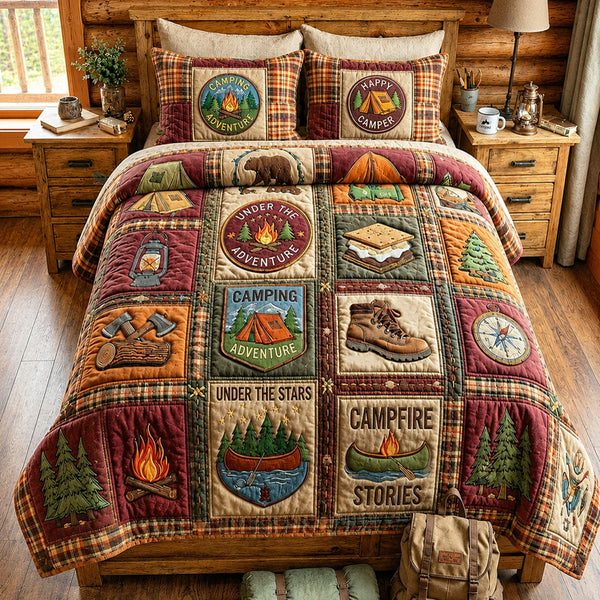 Camping Badge quilted 3-piece bedding set on a made bed with two matching pillow shams