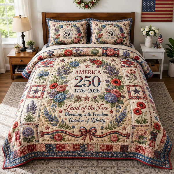 America 250 quilted 3-piece bedding set on a made bed in a warmly lit bedroom