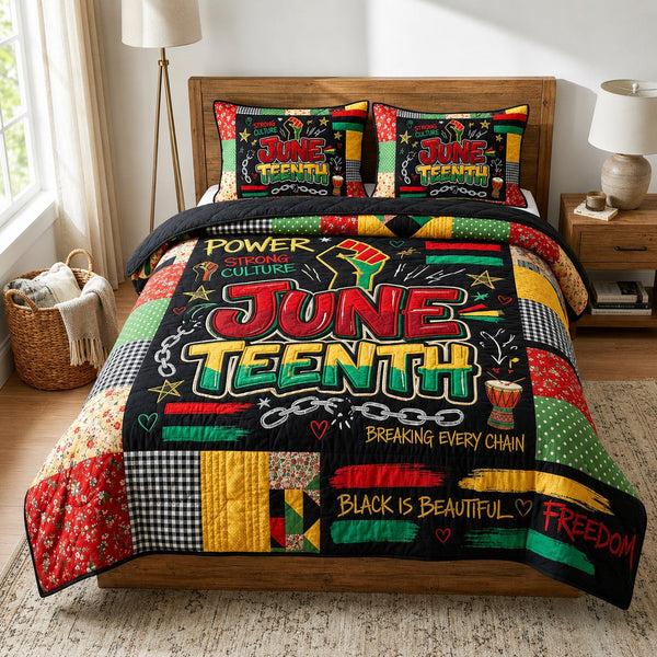 Chain Breaker quilted 3-piece bedding set on a made bed with two matching pillow shams