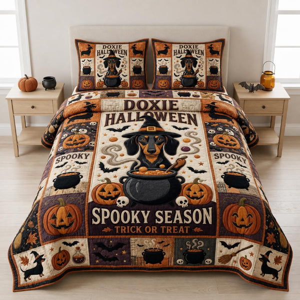 Doxie Halloween quilted 3-piece bedding set on a made bed against a dark styled interior