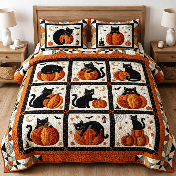 Cat Pumpkin Patch quilted 3-piece bedding set on a made bed against a dark styled interior