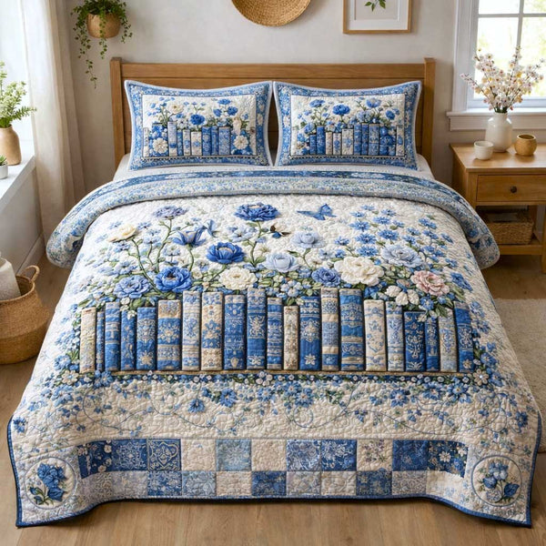 Blooming Books quilted 3-piece bedding set on a made bed with two matching pillow shams