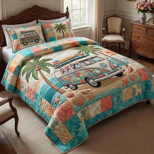 Beachside quilted 3-piece bedding set on a made bed in a light coastal bedroom