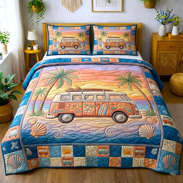 Beachside quilted 3-piece bedding set on a made bed in a light coastal bedroom