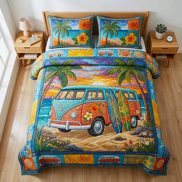 Beachside quilted 3-piece bedding set on a made bed in a light coastal bedroom