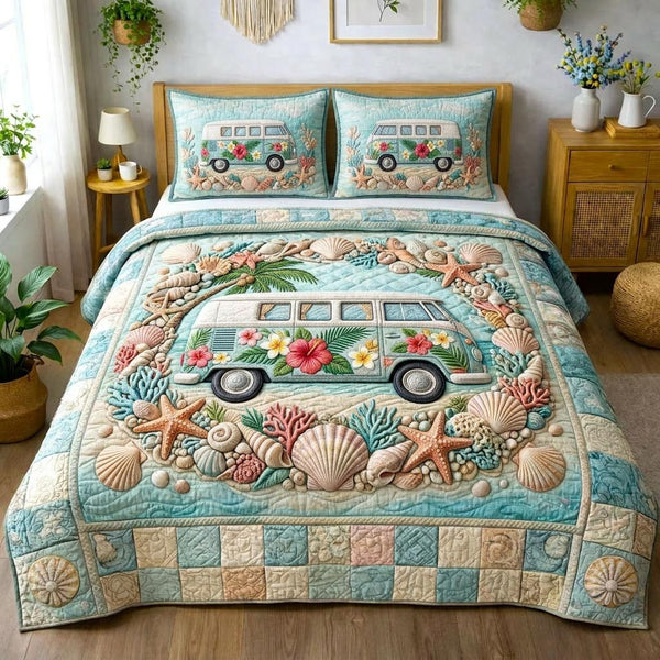 Beachside quilted 3-piece bedding set on a made bed in a light coastal bedroom