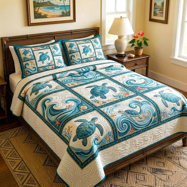 Beachside Escape quilted 3-piece bedding set on a made bed in a light coastal bedroom