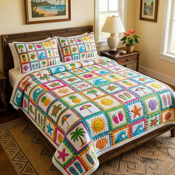 Coastal Escape quilted 3-piece bedding set on a made bed in a light coastal bedroom