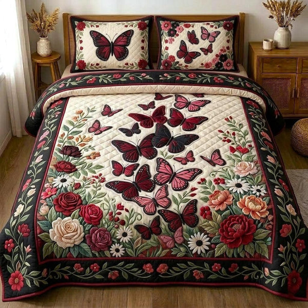 Butterfly Garden quilted 3-piece bedding set on a made bed with two matching pillow shams