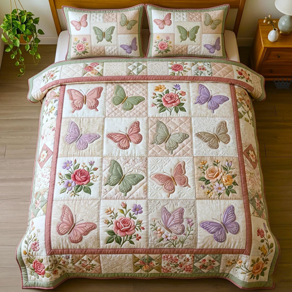 Butterfly Dream quilted 3-piece bedding set on a made bed with two matching pillow shams