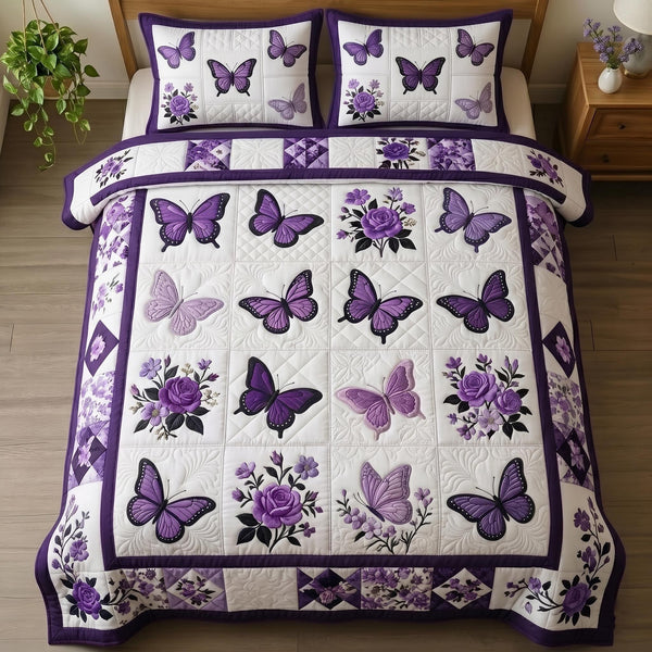 Butterfly Dream quilted 3-piece bedding set on a made bed with two matching pillow shams