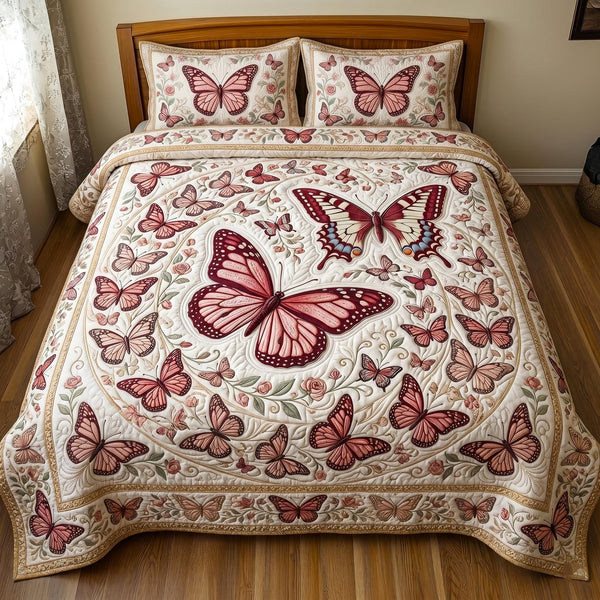 Butterfly Dream quilted 3-piece bedding set on a made bed with two matching pillow shams