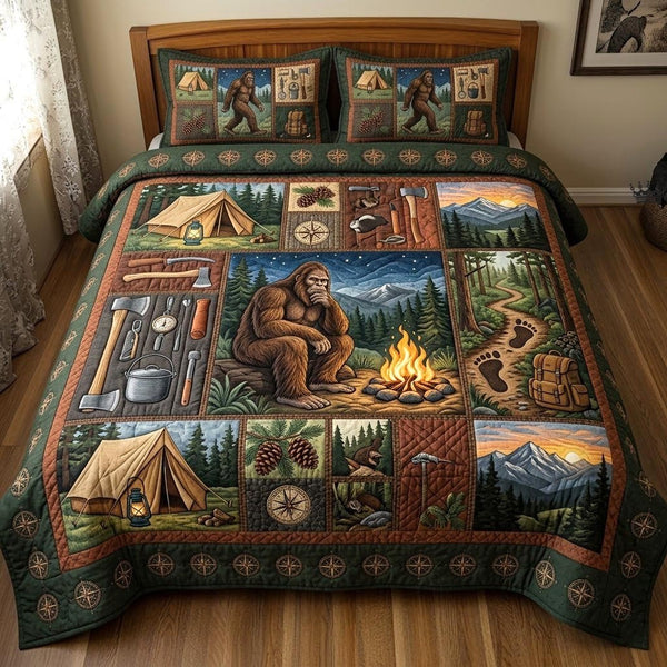 Bigfoot Trail quilted 3-piece bedding set on a made bed with two matching pillow shams
