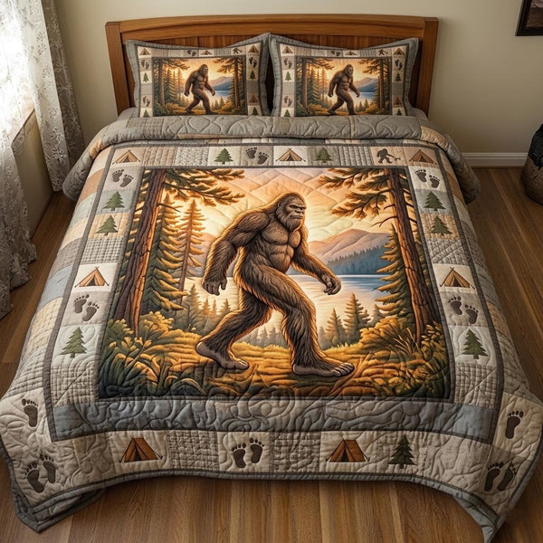 Bigfoot Trail quilted 3-piece bedding set on a made bed with two matching pillow shams