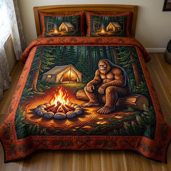 Bigfoot Trail quilted 3-piece bedding set on a made bed with two matching pillow shams