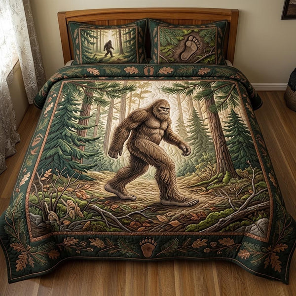 Bigfoot Trail quilted 3-piece bedding set on a made bed with two matching pillow shams