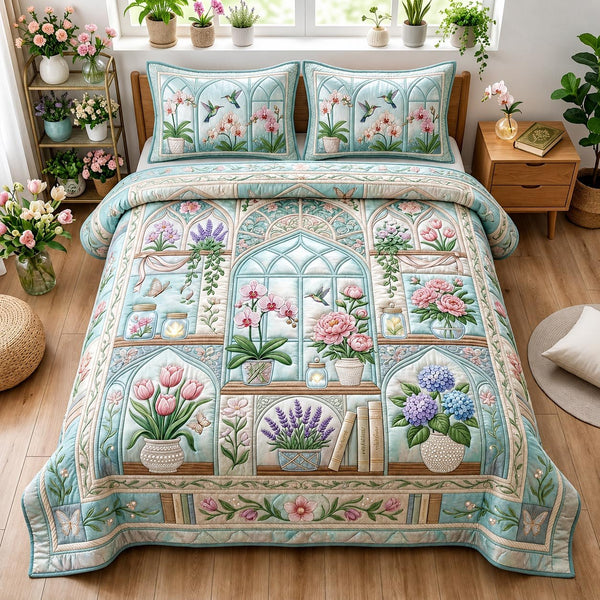 Bloom Garden quilted 3-piece bedding set on a made bed with two matching pillow shams