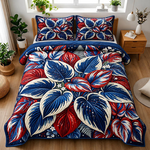Botanical Haven quilted 3-piece bedding set on a made bed with two matching pillow shams