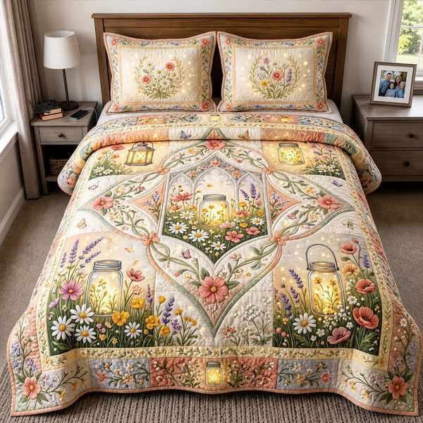 Bloom Garden quilted 3-piece bedding set on a made bed with two matching pillow shams