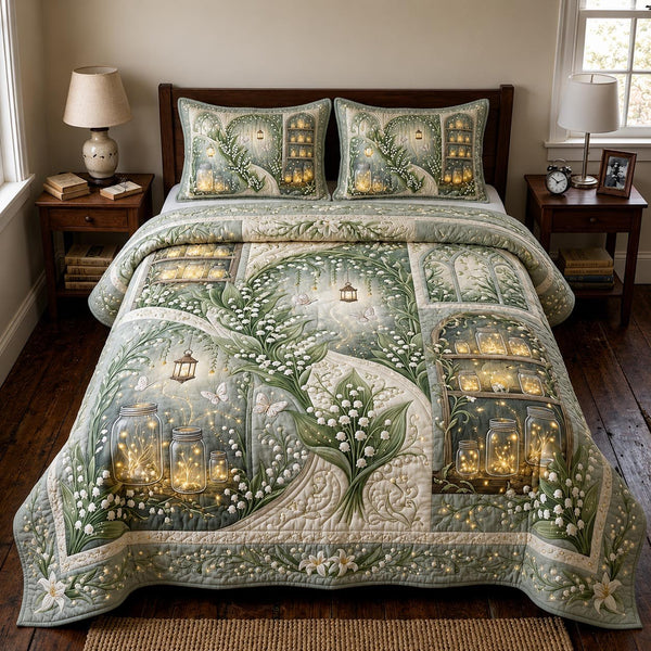 Bloom Haven quilted 3-piece bedding set on a made bed with two matching pillow shams