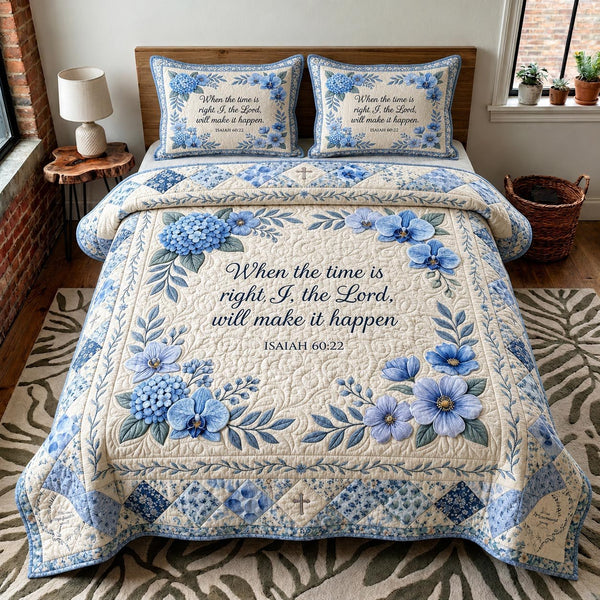 Faith Blossom quilted 3-piece bedding set on a made bed in a softly lit bedroom