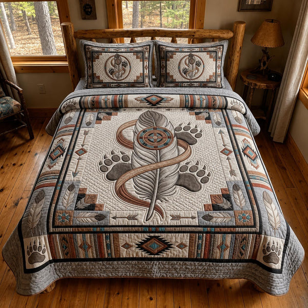 Bear Wisdom quilted 3-piece bedding set on a made bed with two matching pillow shams