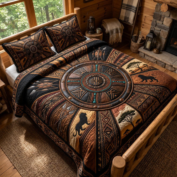 Cultural Roots quilted 3-piece bedding set on a made bed with two matching pillow shams