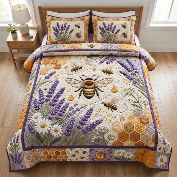 Bee Garden quilted 3-piece bedding set on a made bed with two matching pillow shams