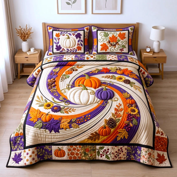 Autumn Harvest quilted 3-piece bedding set on a made bed with two matching pillow shams