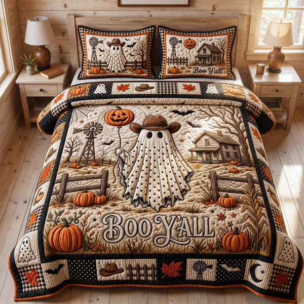 Boo Yall quilted 3-piece bedding set on a made bed with two matching pillow shams